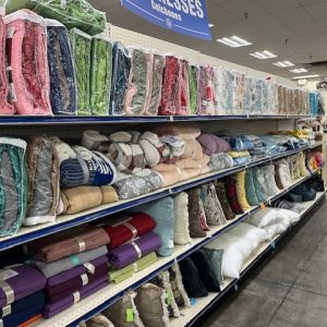 Wall display of linens and pillows